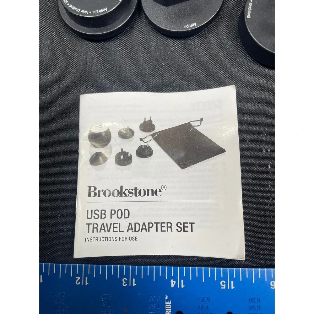 Brookstone USB Pod Travel Adapter Set International Dual Port Black with Pouch